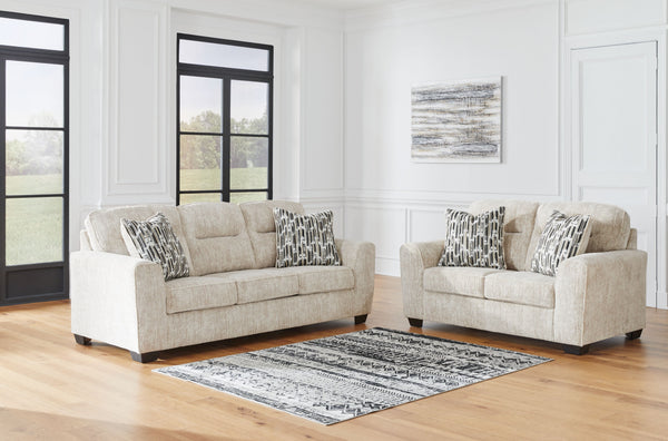 This sofa speaks to those drawn to fresh, contemporary style with richly neutral appeal. Subtle and sophisticated, the plush upholstery and dark tri-block legs are a natural complement for so many color schemes. Two accent pillows make the seating even mo