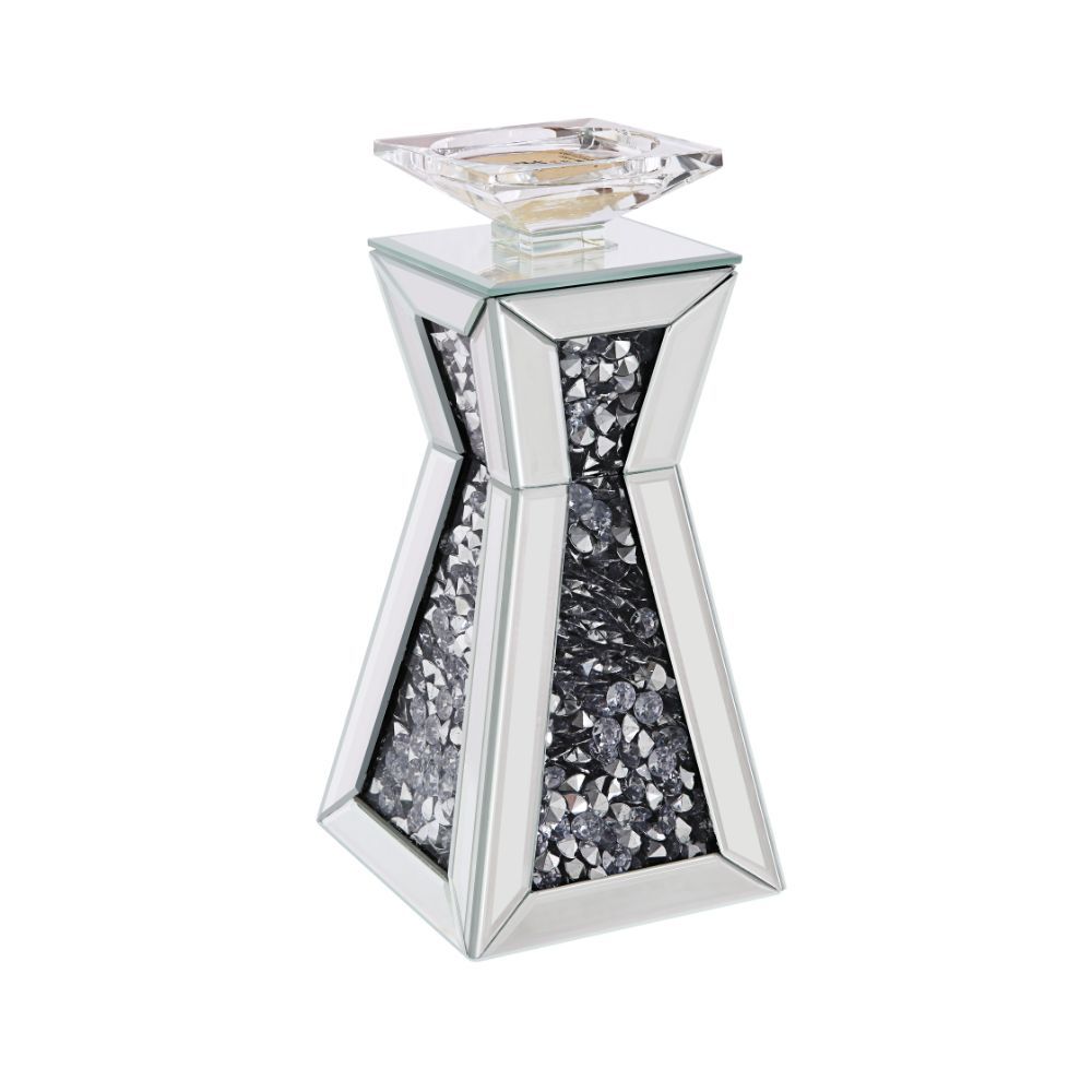 Strut your style with this beautiful and elegant Nowles candleholder collection. With a beautifully crafted mirrored frame and faux gem inlay, it is sure to compliment any arrangement. Available in two different sizes, light it up and be dazzled by the gl