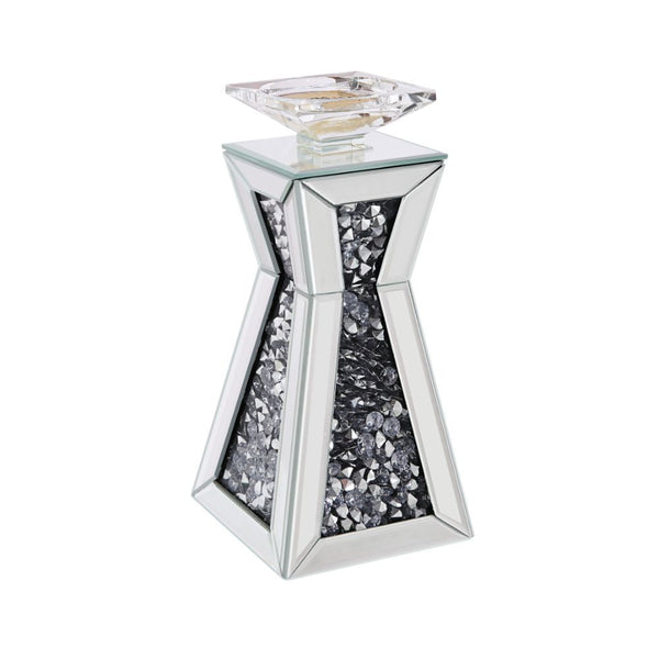 Strut your style with this beautiful and elegant Nowles candleholder collection. With a beautifully crafted mirrored frame and faux gem inlay, it is sure to compliment any arrangement. Available in two different sizes, light it up and be dazzled by the gl
