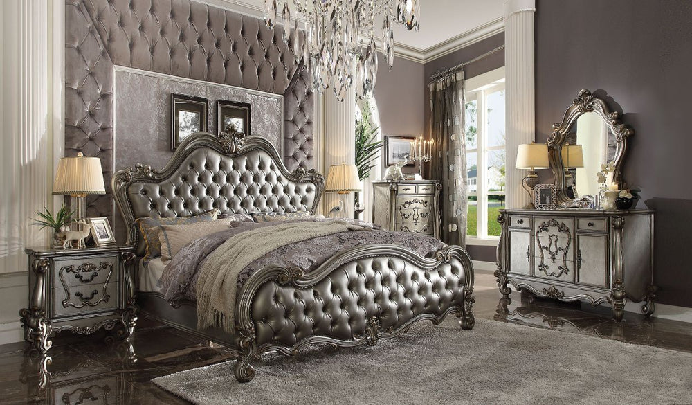 Sleep like royalty with this Versailles II bed set. The bedroom set was inspired by old European design. The bed features carved scrollwork accent with nailhead trim Decor and tufted upholstery on both headboard and footboard. The accent pieces crafted in