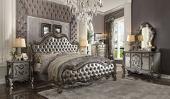Sleep like royalty with this Versailles II bed set. The bedroom set was inspired by old European design. The bed features carved scrollwork accent with nailhead trim Decor and tufted upholstery on both headboard and footboard. The accent pieces crafted in