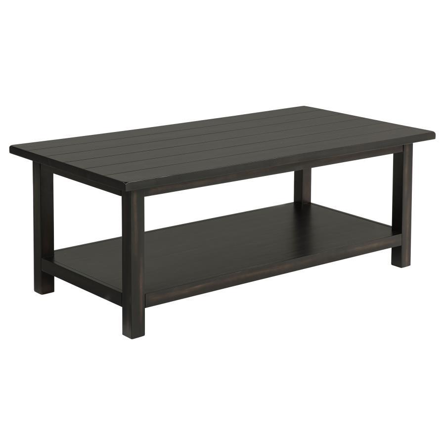 Bring timeless appeal and ample surface space to your living area with this rectangular coffee table. A pine wood and engineered wood construction, enhanced by pine veneer, ensures durability while exuding a warm rustic charm. Its open lower shelf keeps d