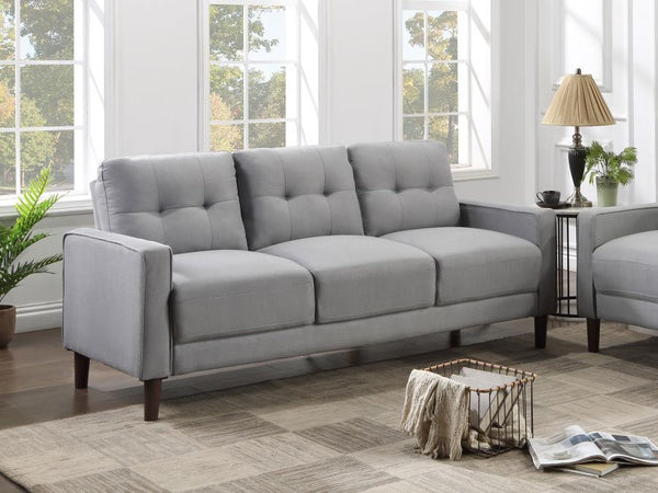  this sofa boasts a perfect small-scale design. Its classic track arm and self-welt detailing highlight the superior tailoring. The grid-tufted boxed back cushions and pocket coil spring cushion construction ensu