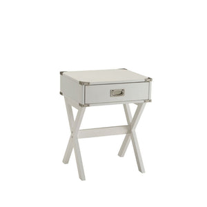 Bring the trending campaign style into your home with this updated Babs end table. With featuring of metal corner strapping and flush mount drawer pull which is true to the style. It is also offered in three colors to expand the options of this timeless d