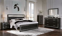 Rest easy. The luxurious look youâ€™ve been dreaming of is yours for the taking, at a price sure to put you at ease. This upholstered panel bedroom group brings a sense of old Hollywood with a contemporary flair. A deep, dark finish, faceted chrome-tone a