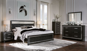 Rest easy. The luxurious look youâ€™ve been dreaming of is yours for the taking, at a price sure to put you at ease. This upholstered panel bedroom group brings a sense of old Hollywood with a contemporary flair. A deep, dark finish, faceted chrome-tone a