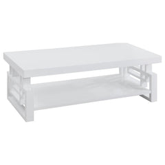 This modern rectangular coffee table adds sleek style to any living room. Crafted from durable engineered wood, it boasts a pristine white high-gloss finish that reflects light beautifully. The open shelf below offers practical storage, while the geometri