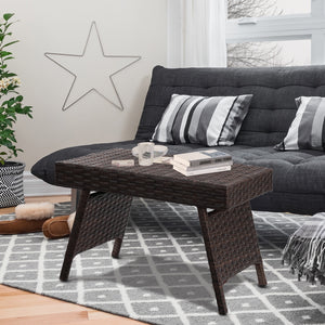 This brown gradient coffee table is made out of durable  weather-resistant resin and an open-weave material  which will not fray and can tolerate high summer temperatures. Â   Their contemporary design and ergonomic comfort are exactly the right combinati