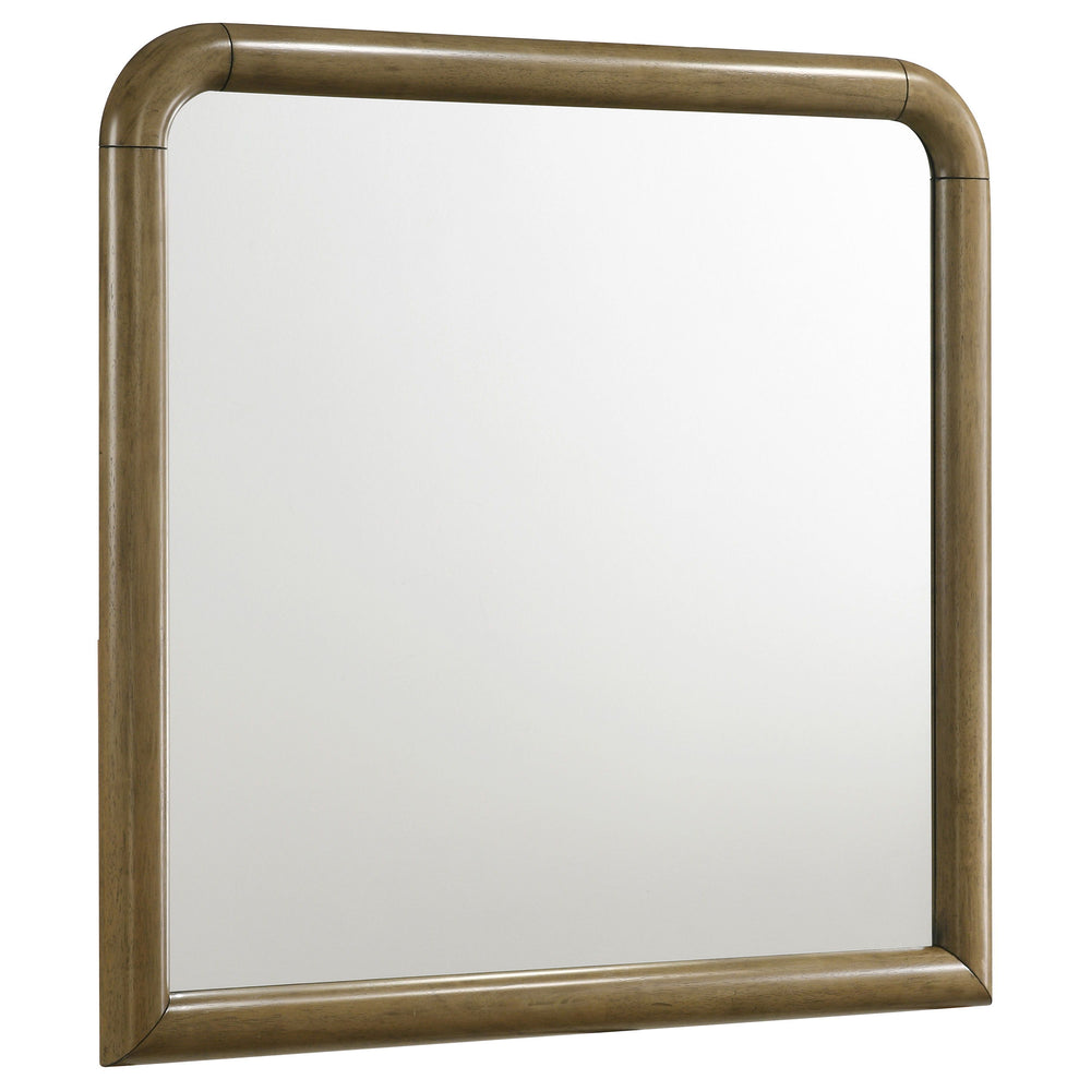 This dresser mirror brings light and elegance to your bedroom with its clean lines and rounded frame. The nutmeg wood finish offers a warm and inviting feel, perfect for complementing both modern and traditional decor. Its curved top and soft edges create
