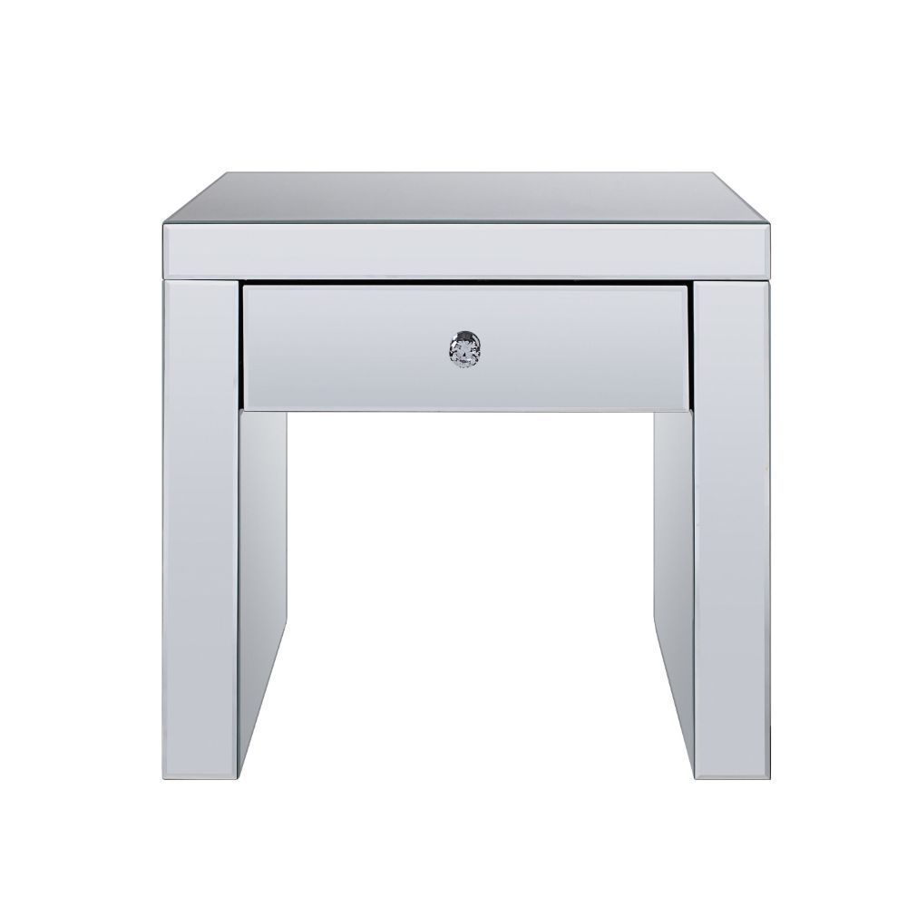 The Noralie End Table will give any room a touch of glamour. This contemporary end table is fully mirrored with a stunning mirror top and a faux diamonds inlay on each leg of its sled base. Use this unique piece as the perfect accent for any room Decor. O