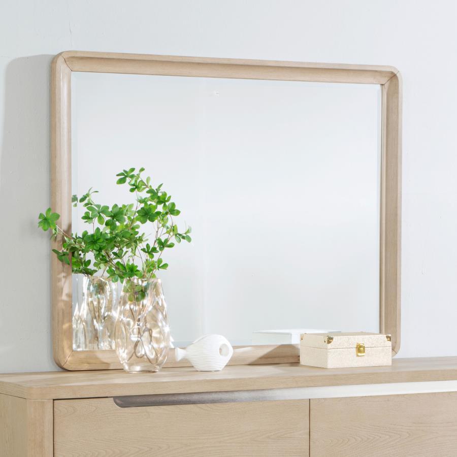 This rectangular dresser mirror adds modern sophistication to your space with its clean lines and light elm wood frame. Rounded edges soften its contemporary design, making it a versatile addition to any room. Built with sturdy materials, this mirror is a