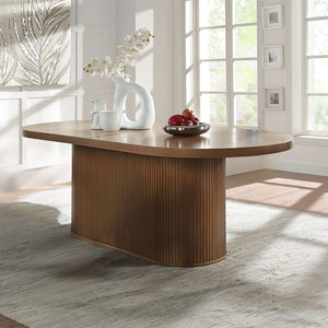 The Gamarya dining collection is designed to provide space for your guests in effortless convenience and tasteful style. This dining collection offers a contemporary vibe to your dining space. The oval tabletop and vertical reeding on the pedestal base le