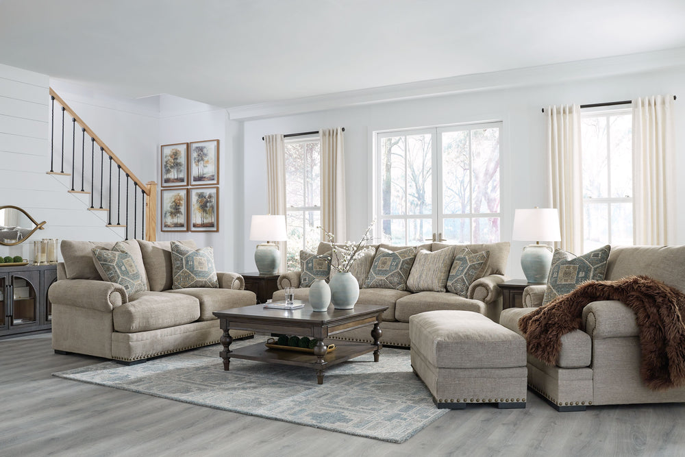 Looking to enhance your home-'s visual appeal? This sofa and loveseat set with matching oversized chair and ottoman offers sophisticated design, comfort and elegance with tonal colors, roll arms and nailhead accents. Enjoy optimal coziness as you nestle i