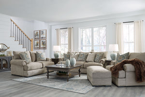 Looking to enhance your home-'s visual appeal? This sofa and loveseat set with matching oversized chair and ottoman offers sophisticated design, comfort and elegance with tonal colors, roll arms and nailhead accents. Enjoy optimal coziness as you nestle i