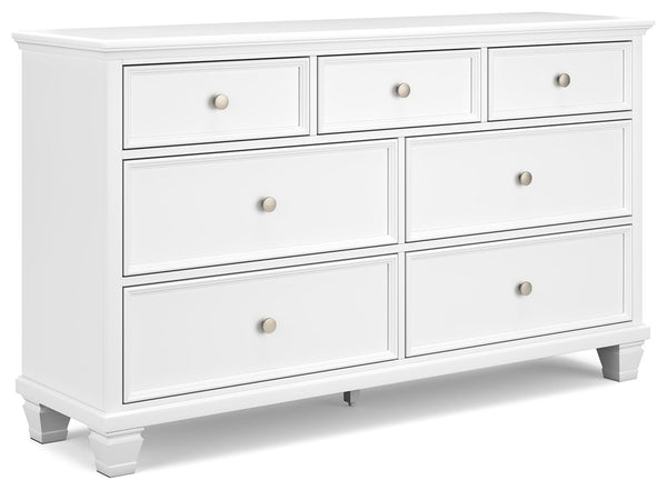 This dresser exudes timeless casual design that-'s ready to define your personal space. Its clean, contemporary white finish, framed drawer fronts and round metal knobs easily adapt to a variety of interiors. Featuring seven storage drawers with dovetail 