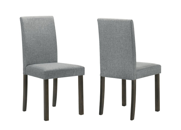 This dining group is a perfect fusion of minimalist design and everyday practicality. The sleek, rectangular table boasts a smooth, dark wood finish that adds a touch of sophistication to any dining space. Complemented by four comfortable upholstered chai