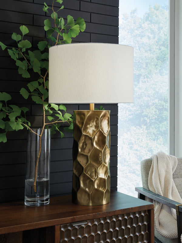  this table lamp adds layers of dimension and visual interest to your space. A goldtone finish ups the glam appeal to complete the luxe take on contemporary design.<br><br><b>Addit