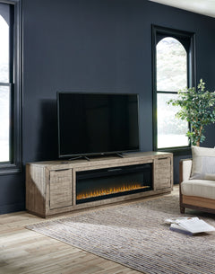 This extra-large TV stand with fireplace insert is sure to win your heart with its daring take on modern rustic expression. Its crisp, clean minimalist-chic profile is enriched with striking pine wood grain and a weathered gray finish with distressed saw 