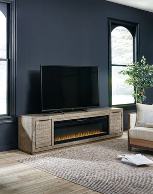 This extra-large TV stand with fireplace insert is sure to win your heart with its daring take on modern rustic expression. Its crisp, clean minimalist-chic profile is enriched with striking pine wood grain and a weathered gray finish with distressed saw 