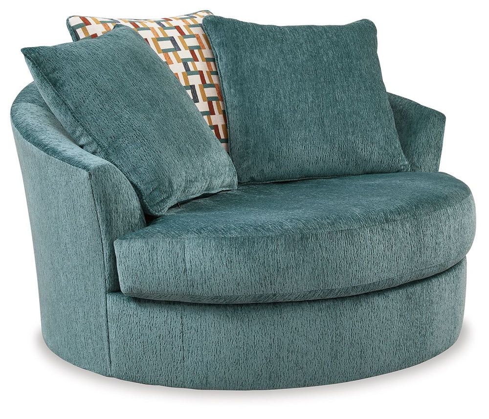 Express your uniquely chic style with this oversized swivel accent chair. Its fresh approach to color creates a vibrant yet refined vibe in your living room that friends and family will love to lounge in. And you can count on classic comfortâ€”the chairâ€
