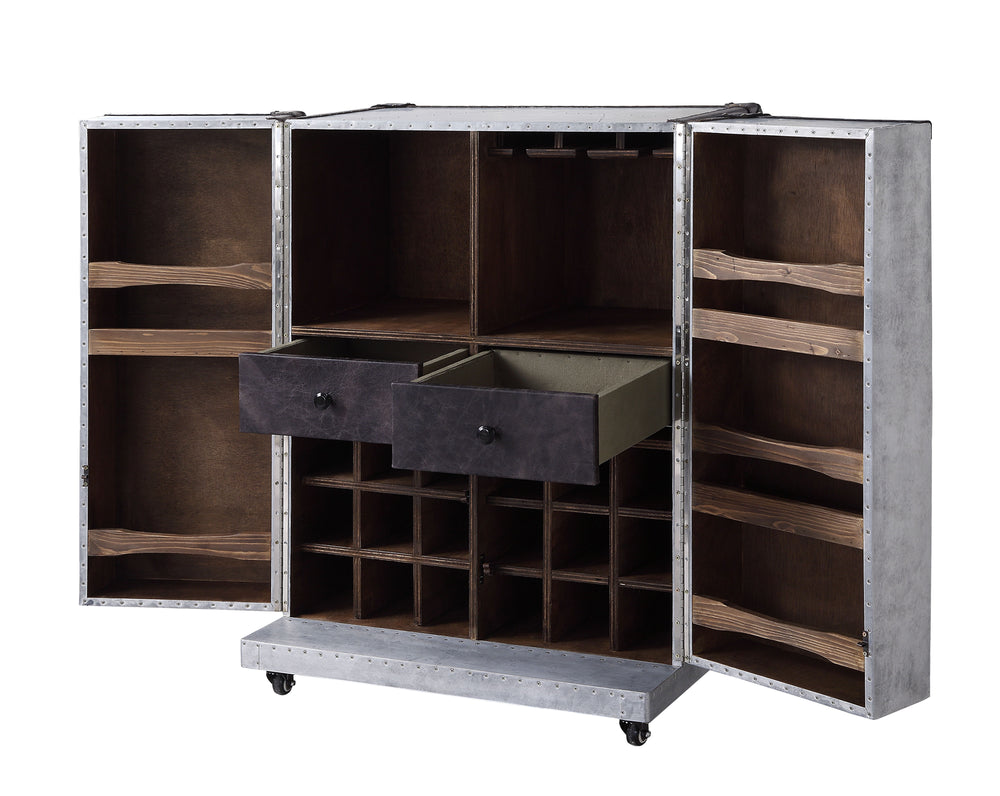 This Brancaster wine cabinet has a steamer trunk design thatâ€™s as functional as it is handsome. The aluminum exterior is punctuated with top grain leather trim, with nailhead accents at the corners and edges. Pull the soft, sturdy leather handles to rev