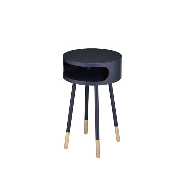 This Sonria round end table offers a contemporary take on a stylish retro design, ideal for your living room, family room, or bedroom! With its one shelf, you can conveniently store remote controls or other small items in the open compartment. The natural