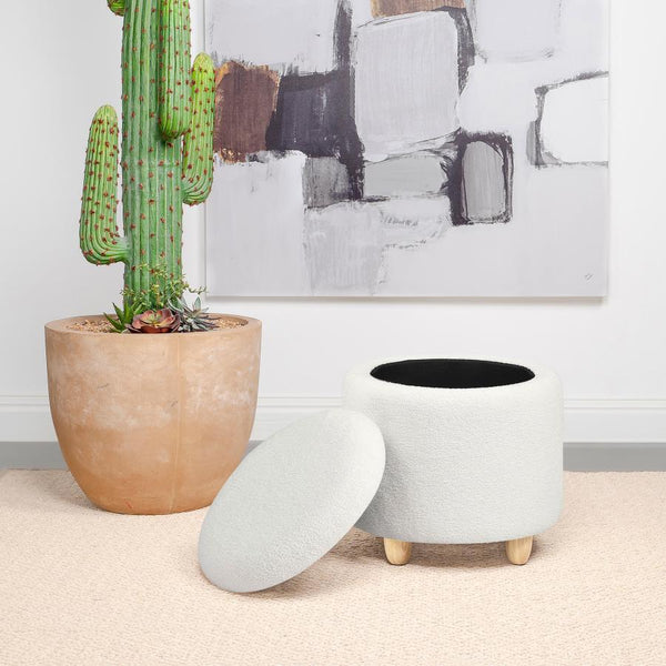  this round storage ottoman is a stylish statement of comfort and practicality. Upholstered in a soft faux sheepskin