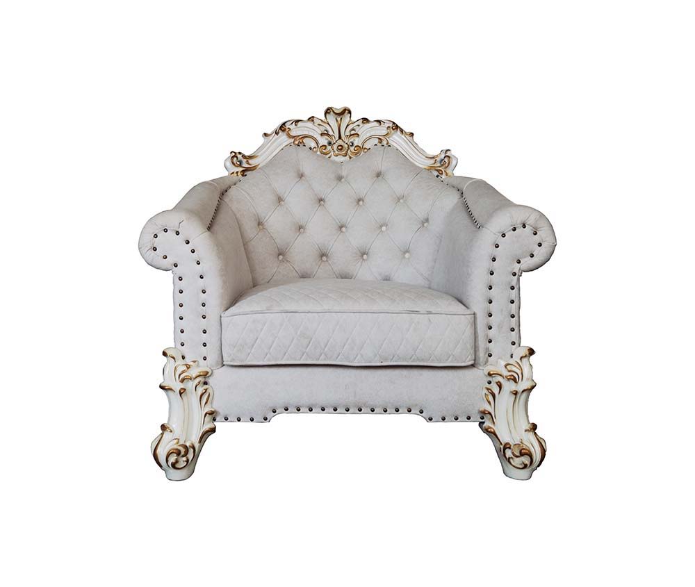 Tracing back to the classical Baroque era, expressed with intent and conviction, our new interpretation of Vendome II is donned. The Vendome II sofa-'s light gray fabric is grand and classy with crystal like button tufting on the back in a crackled gold p
