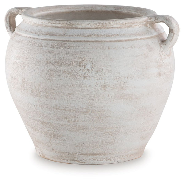 Celebrate the artisanal character of ceramics with this vase. Its distressed white finish has a time-worn, weathered appeal, offering the look of the past with a modern feel. The vase-'s neutral tone makes it a go-to for all seasons, allowing you to stage