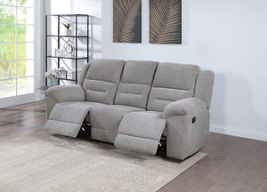  this sofa offers a plush and inviting feel that enhances any living space. The manual recline