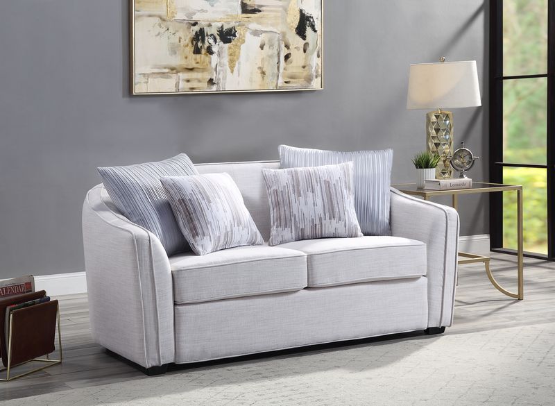 Create a clean, contemporary look with the gently curved Mahler II living room set. The inner wooden frame and block plastic legs offer maximum support. Upholstered in a beige textured-linen fabric. The barrel seat back makes for plush, modern depth that 