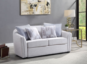 Create a clean, contemporary look with the gently curved Mahler II living room set. The inner wooden frame and block plastic legs offer maximum support. Upholstered in a beige textured-linen fabric. The barrel seat back makes for plush, modern depth that 