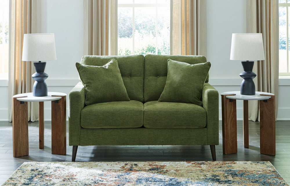 Feed your mid-century modern nostalgiaâ€”with a contemporary twist. A vibrant trend-right hue and comfy feel make this loveseat perfect for lounging solo or with friends and family. Its linear profile adds plenty of fresh style, and the tapered accent leg