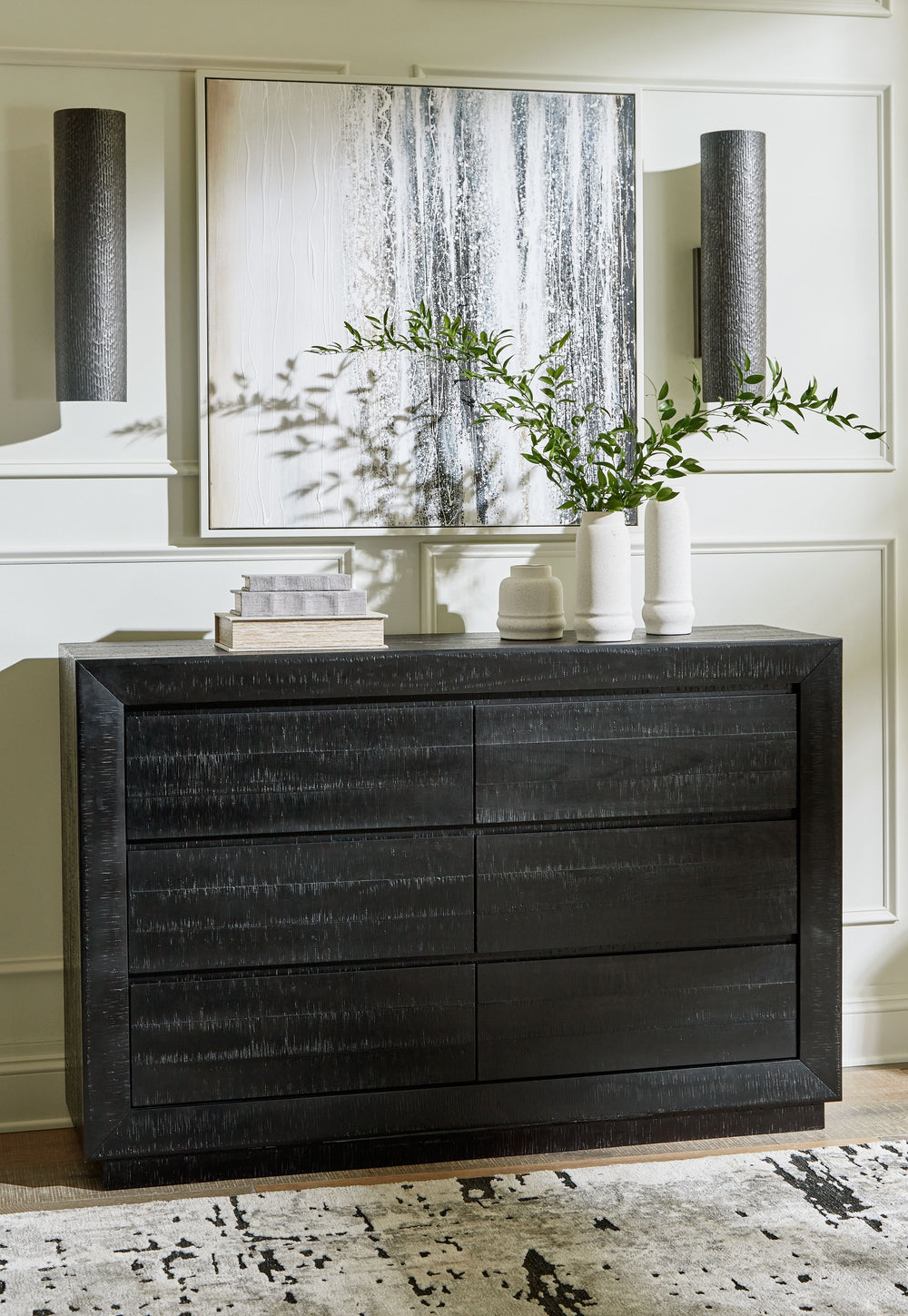 The heavily distressed surface of this dresser reflects balance between farmhouse and contemporary style. With streamlined storage and a timeless design thatâ€™s equal parts cool and casual, it offers uncomplicated sophistication with a modern edge.<br><b