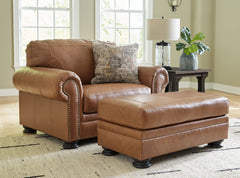 Merging traditional motifs with a modern hue, this living room set ties your transitional seating area together. Classic roll arms decorated with nailhead trim bookend the comfortable cushions for a bit of extra flair. Itâ€™s approachable, yet luxurious. 