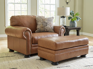 Merging traditional motifs with a modern hue, this living room set ties your transitional seating area together. Classic roll arms decorated with nailhead trim bookend the comfortable cushions for a bit of extra flair. Itâ€™s approachable, yet luxurious. 
