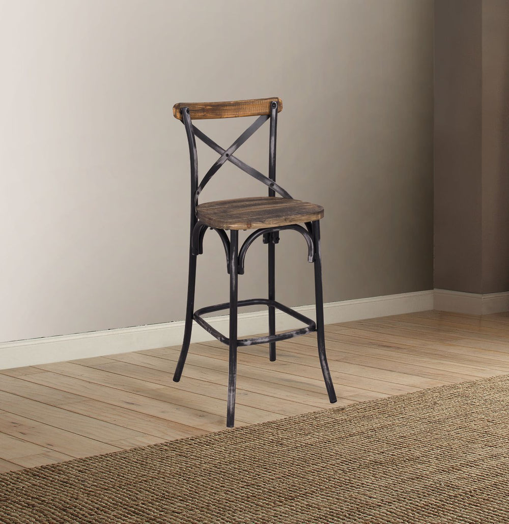 The Zaire collection chairs offer a vintage style inspired by Parisian Bistros chairs. Features: reclaimed wood and metal looks, simple -"X-" style backrest, wooden seat, slightly flared four-legged base with footrest supports. Handsomely Crafted in Walnu