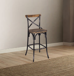 The Zaire collection chairs offer a vintage style inspired by Parisian Bistros chairs. Features: reclaimed wood and metal looks, simple -"X-" style backrest, wooden seat, slightly flared four-legged base with footrest supports. Handsomely Crafted in Walnu