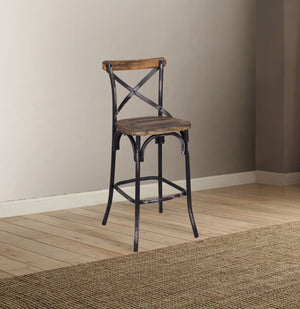 The Zaire collection chairs offer a vintage style inspired by Parisian Bistros chairs. Features: reclaimed wood and metal looks, simple -"X-" style backrest, wooden seat, slightly flared four-legged base with footrest supports. Handsomely Crafted in Walnu
