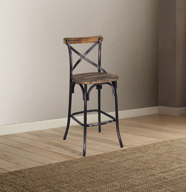 The Zaire collection chairs offer a vintage style inspired by Parisian Bistros chairs. Features: reclaimed wood and metal looks, simple -"X-" style backrest, wooden seat, slightly flared four-legged base with footrest supports. Handsomely Crafted in Walnu