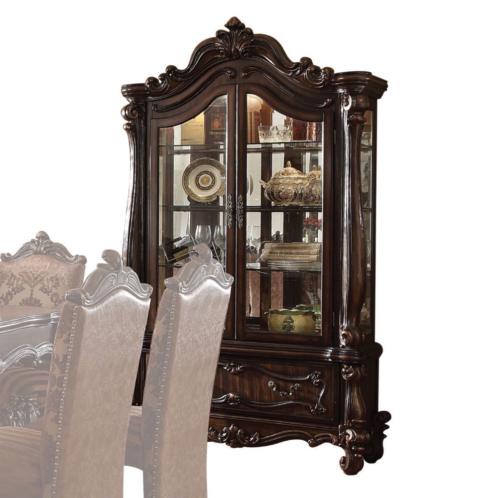 Curio Cabinet Arched Top: Touch Light & 2 Glass Doors (3 Glass Shelves & Back Mirror Inside) Base: 1 Drw Oversized Scrolled Trim, Leaf Crown and Post-Leg (Poly Resin with Antique Contrast Finish) Drawer: GLIDE Side Metal, DT French, Felt-Lined Included<br