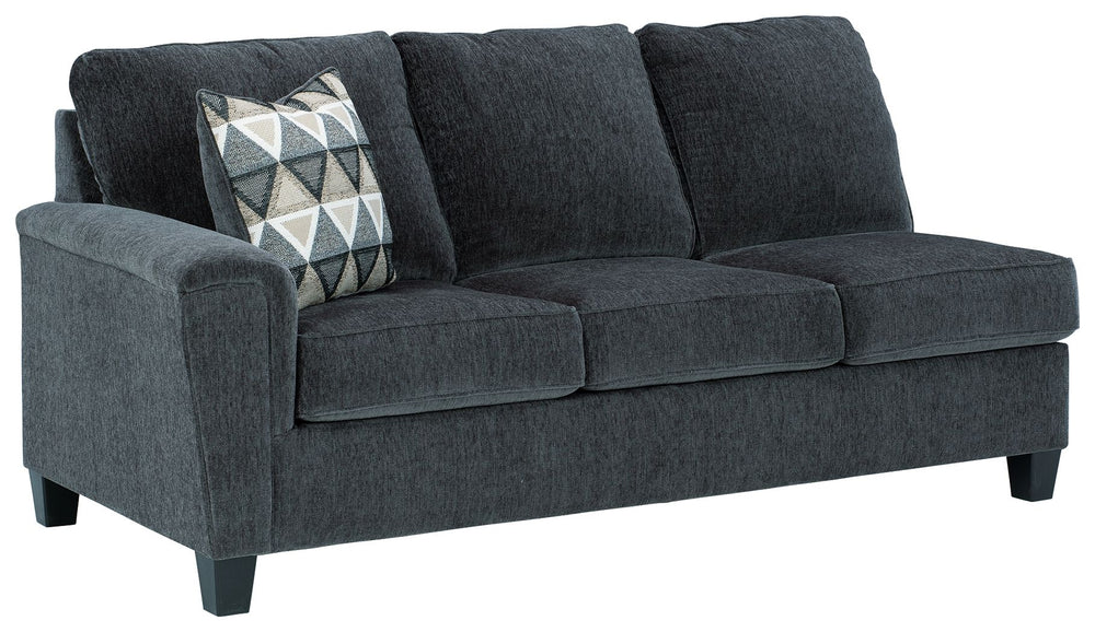 This left-arm facing sofa with corner wedge is made with polyester upholstery. Pairs with other items in the series to make a sectional.<br><br><b>Additional Dimensions</b><br><ul><li>Arm height: 27-"</li><li>Leg height: 4.5-"</li><li>Minimum width of doo
