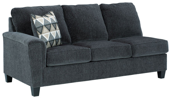 This left-arm facing sofa with corner wedge is made with polyester upholstery. Pairs with other items in the series to make a sectional.<br><br><b>Additional Dimensions</b><br><ul><li>Arm height: 27-"</li><li>Leg height: 4.5-"</li><li>Minimum width of doo
