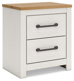 Create a serene countryside retreat with this nightstand. The two-tone design effortlessly adds farmhouse style, while framed drawer fronts with pewter-tone handles enhance its charming appeal. Looking for furniture that offers storage and a peaceful esca