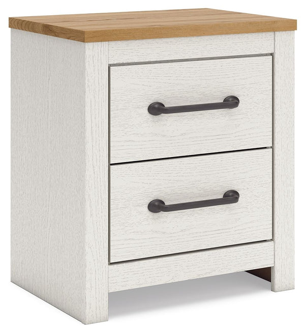 Create a serene countryside retreat with this nightstand. The two-tone design effortlessly adds farmhouse style, while framed drawer fronts with pewter-tone handles enhance its charming appeal. Looking for furniture that offers storage and a peaceful esca