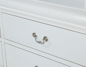  white finish that brings a bright and airy feel to any space. The elegant bed anchors the room with its gracefully