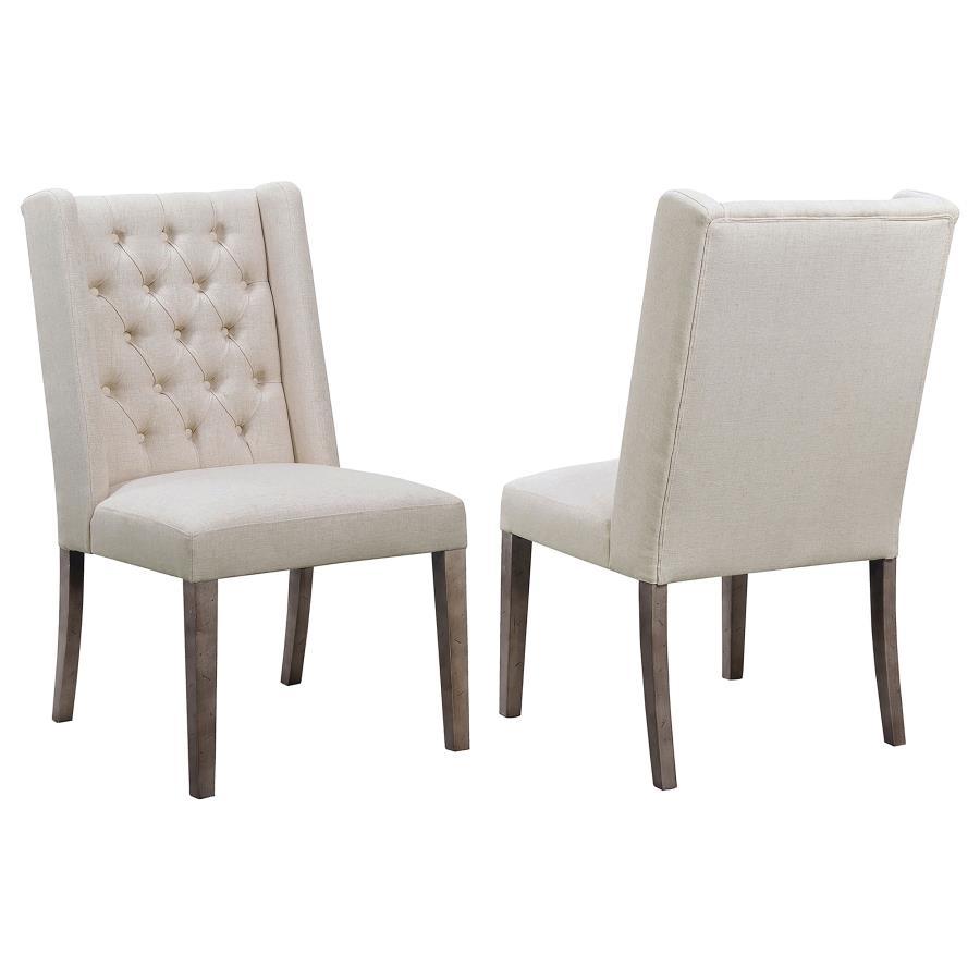 This stately dining chair has a luxurious look and feel that-'s fit for royalty. A soft, plush, comfortable seat allows for restful relaxation. The seat is embellished with eye-catching rivets, giving it a classic look. A sleek silhouette and gently curve