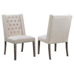 This stately dining chair has a luxurious look and feel that-'s fit for royalty. A soft, plush, comfortable seat allows for restful relaxation. The seat is embellished with eye-catching rivets, giving it a classic look. A sleek silhouette and gently curve