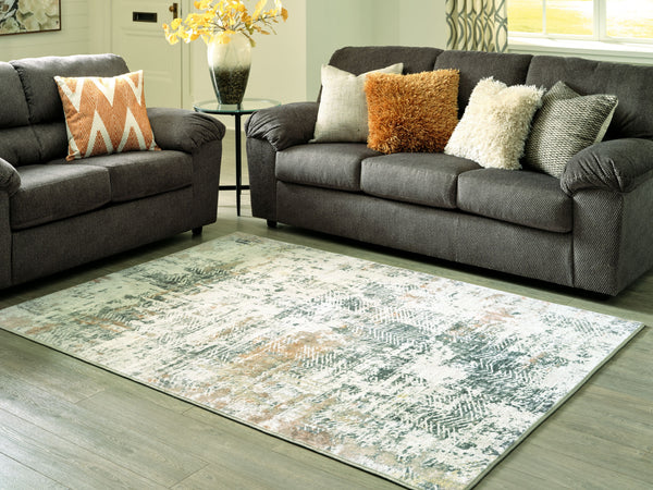  this richly styled faux rabbit fur rug is right on trend. An abstract piece in neutral tones