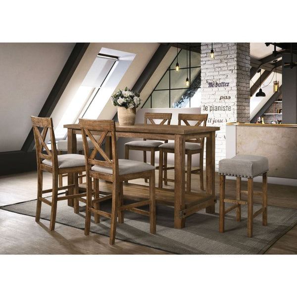 The Martha II Counter Height Table will anchor any dining area in effortless style. This rectangular wood table features a sturdy wood top, lower display, storage shelf and is perfect for weekday meals and family gatherings alike. The versatile table is d